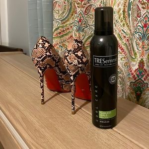 Size 8 bottle of mousee